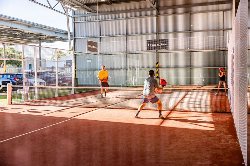 Players on a padel court at Padel Fit, Thebarton