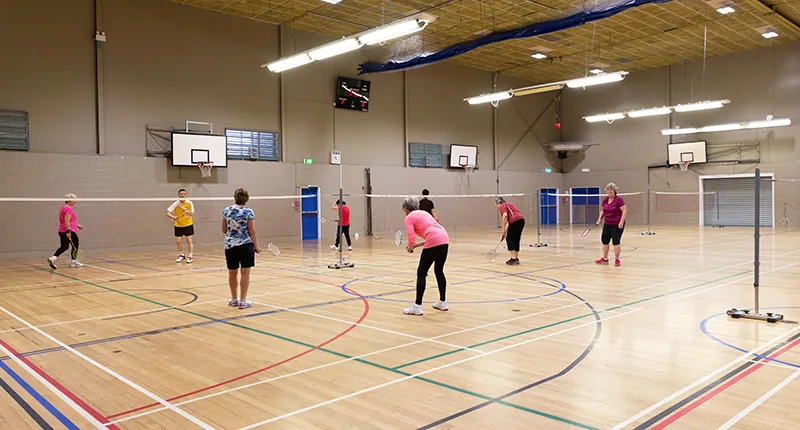 Badminton in the stadium at Howick Leisure Centre