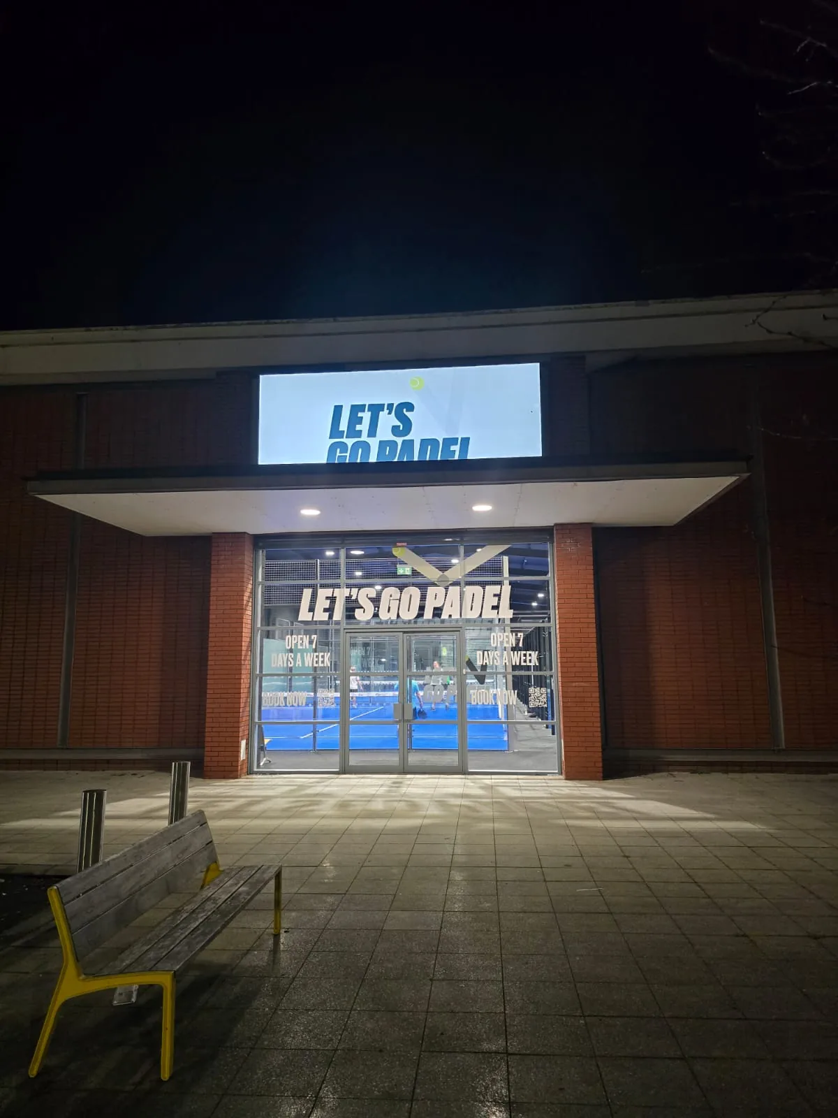 Building photo: the entrance to Let’s Go Padel Crumlin Road, with courts visible inside