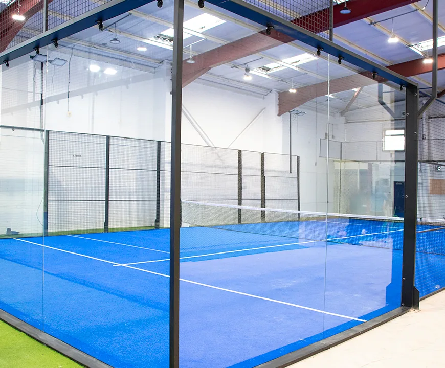 Glass-walled indoor padel court at Pickwick