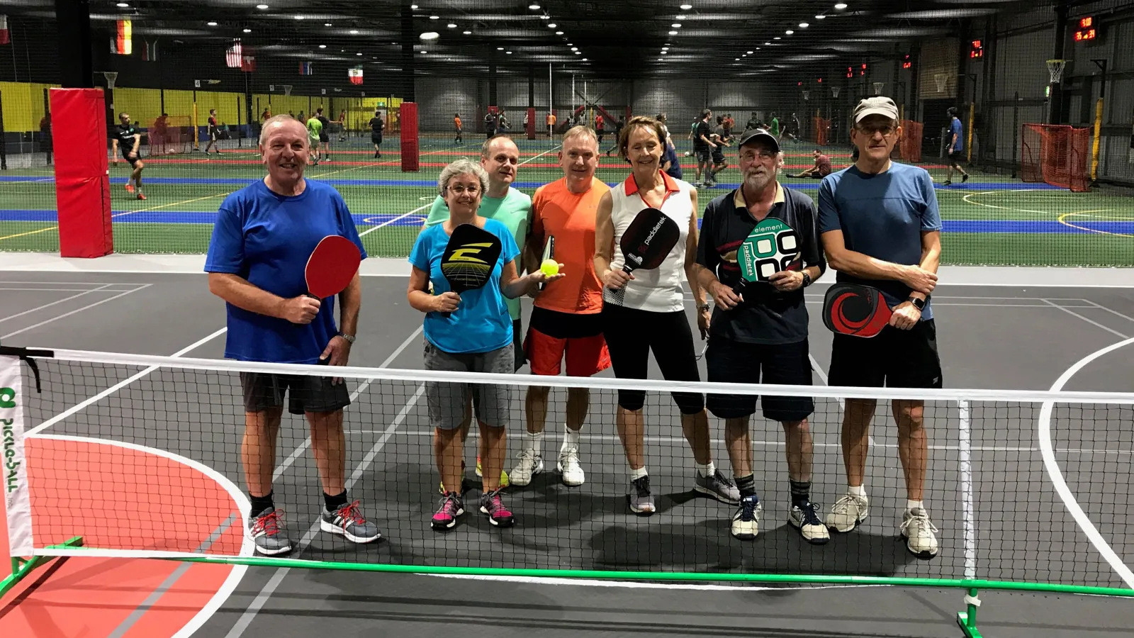 Pickleball players on an indoor court at Brisbane City Indoor Sports