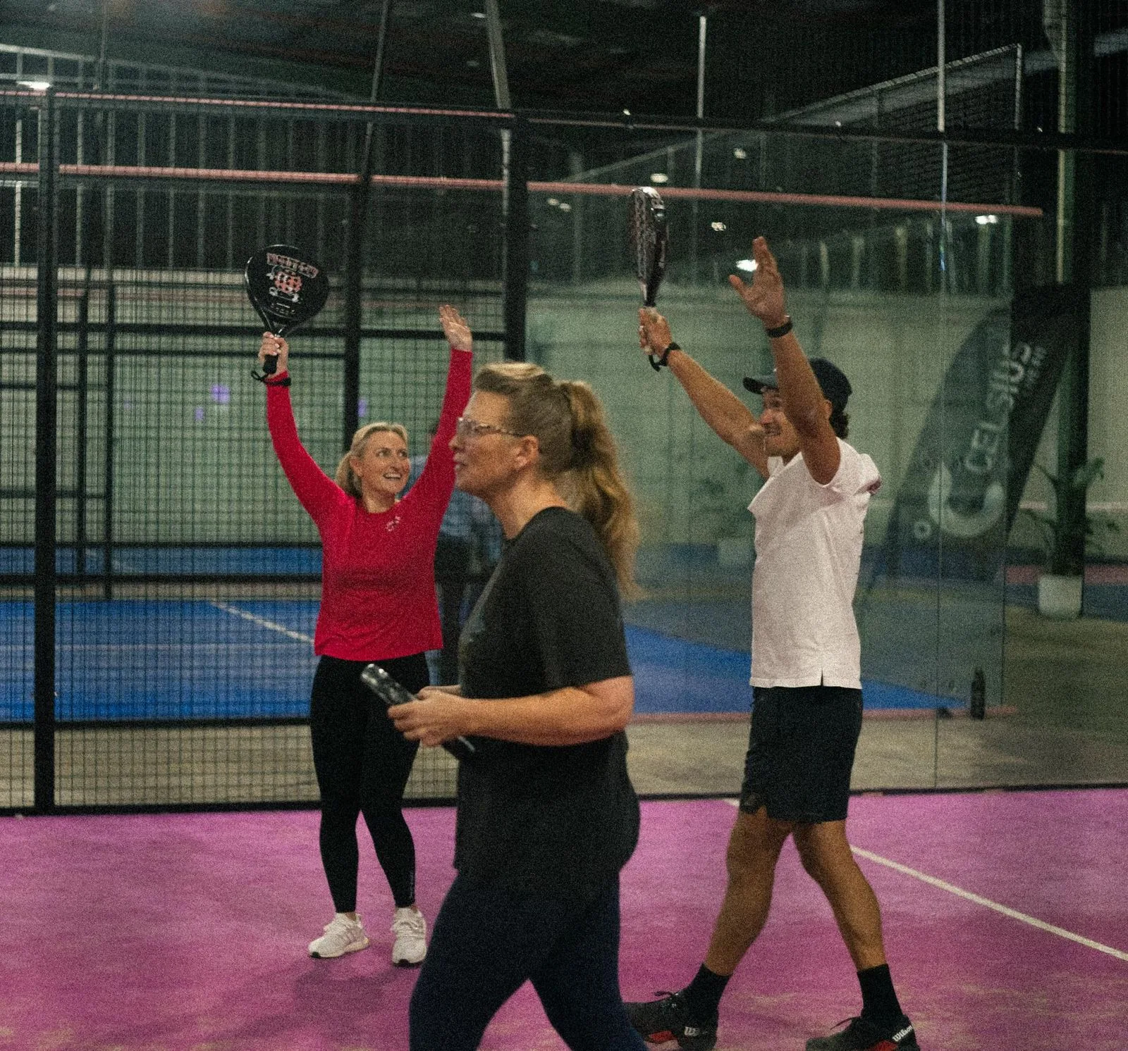 Padel players on court at Canberra Racquet Club