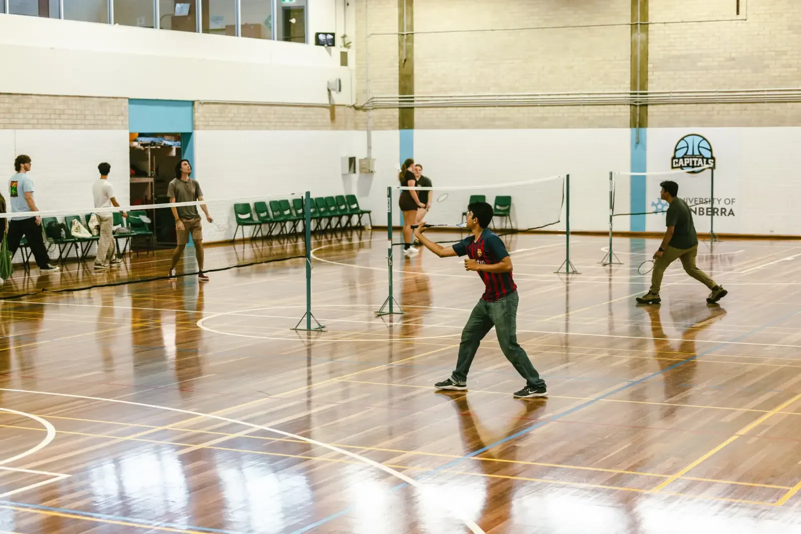 Badminton in the UCFitX sports hall, University of Canberra