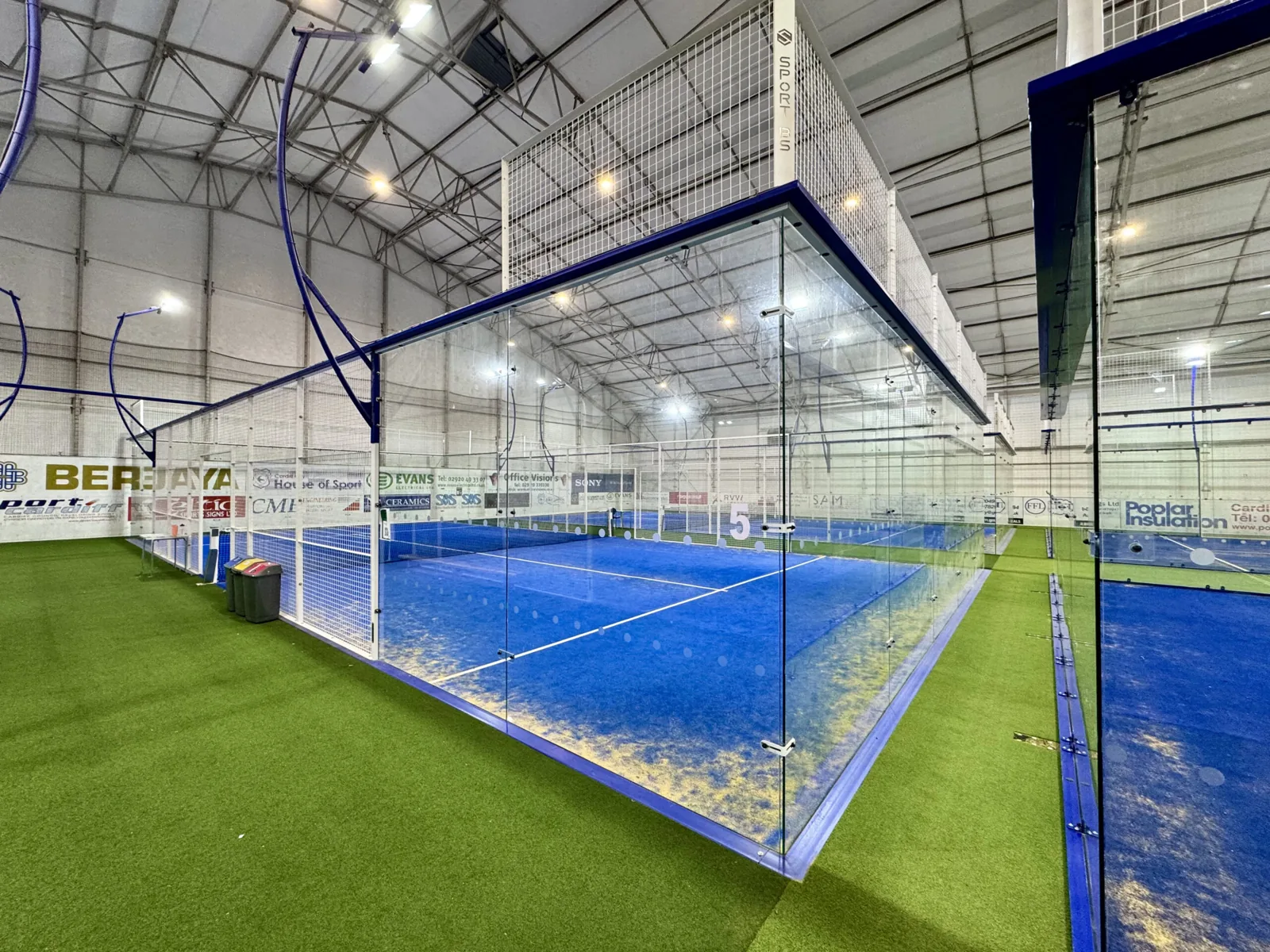 Glass-walled padel court at Cardiff City House of Sport