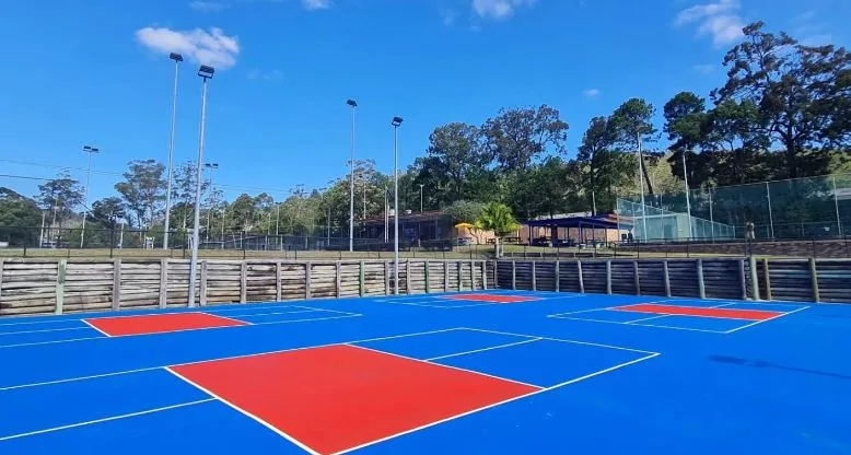 Outdoor pickleball courts and light towers at Gosford Pickleball Club