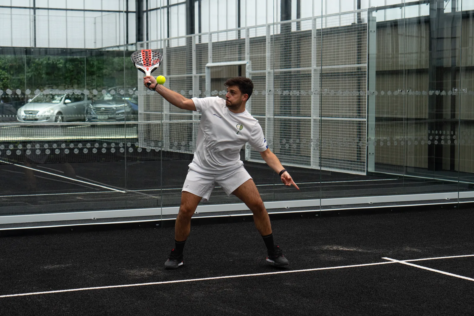 Player on an indoor court at OB Padel, Ballsbridge