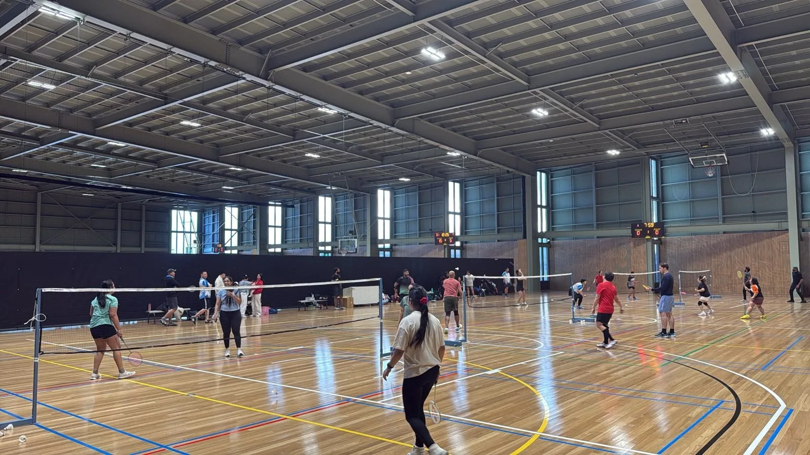 Social badminton on the courts at Tarratarra Stadium, Armstrong Creek