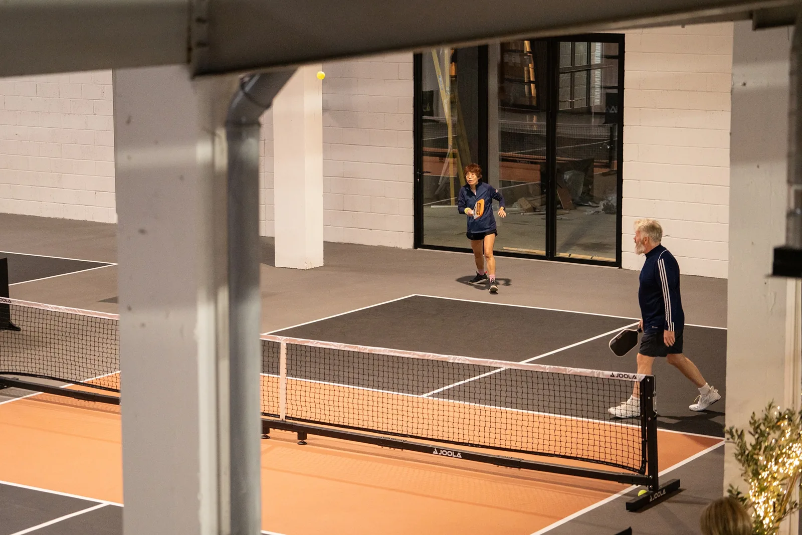 Indoor pickleball courts at The Court