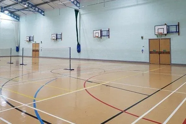 Sports hall with badminton nets at The Waudby Centre