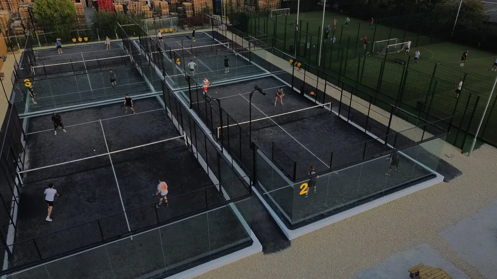 The four outdoor padel courts at Pukka Padel Leeds from above