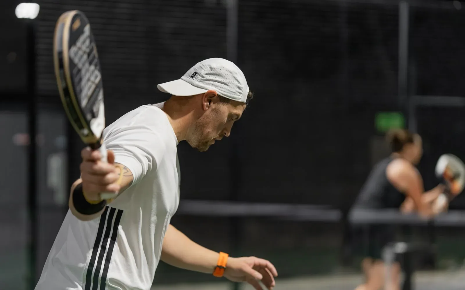 Padel player on an indoor court at Slazenger Padel Clubs Leeds North