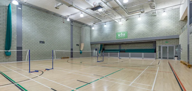 Sports hall set up for badminton at Swiss Cottage Leisure Centre