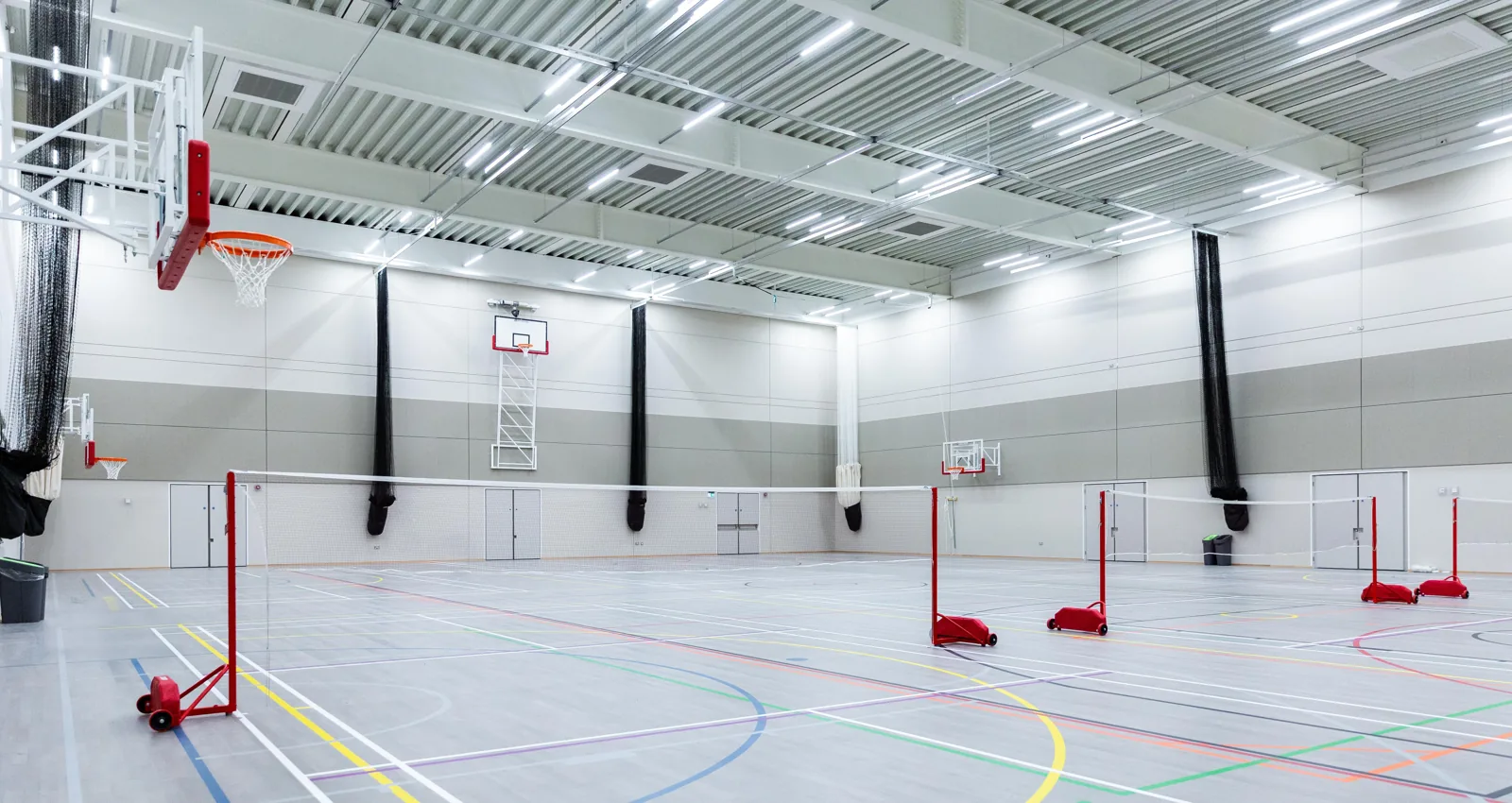 Sports hall with badminton nets at Woolwich Waves
