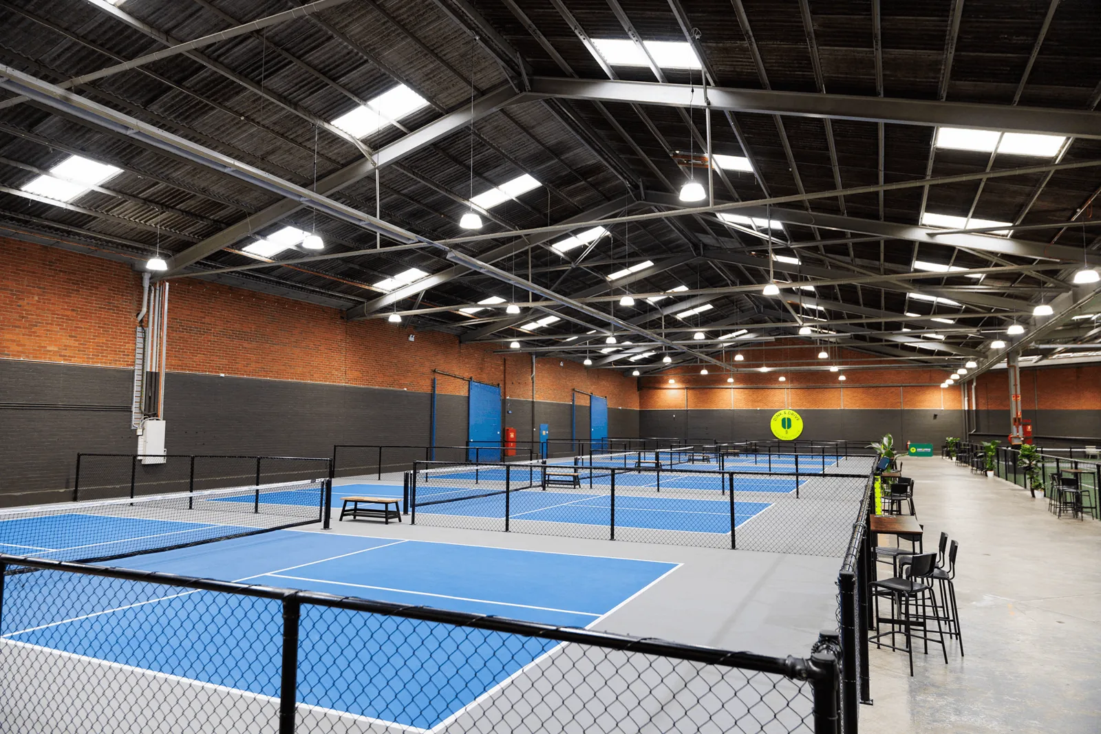 Fenced pickleball courts at Dink & Drive Pickleball Club, Port Melbourne