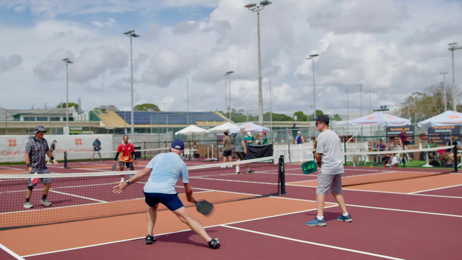 Doubles on the outdoor pickleball courts at The Courtyard, Broadmeadow