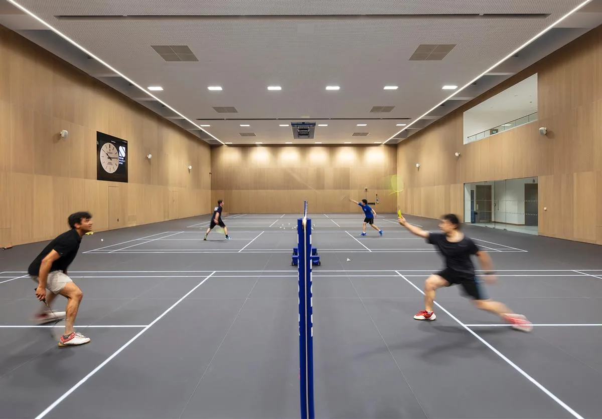 Badminton in a sports hall at Iffley Road Sports Centre