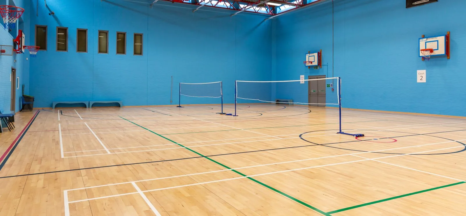 Sports hall set up for badminton at South Reading Leisure Centre
