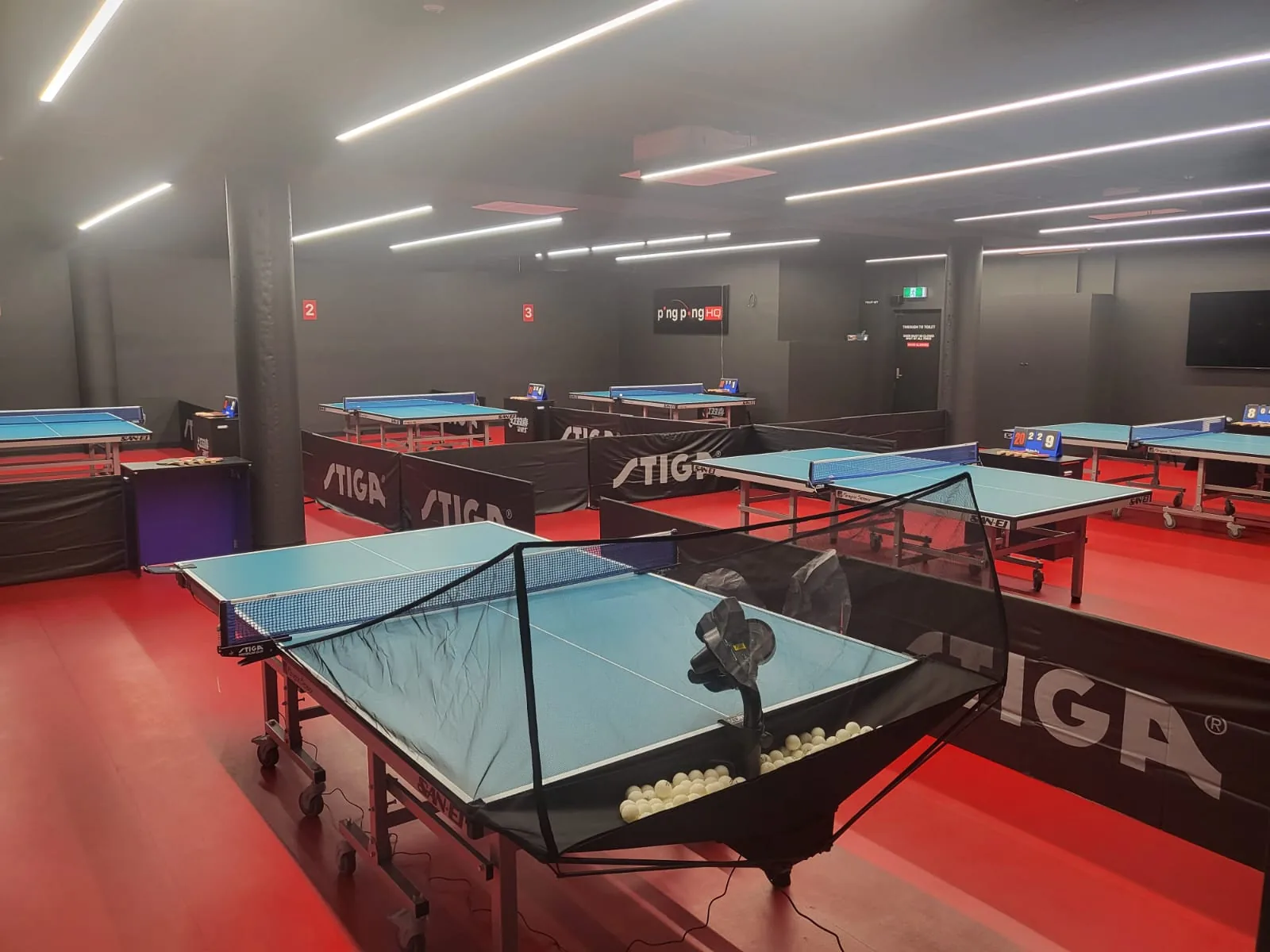 Table tennis tables and ball robot at PingPong HQ, Kingsgrove