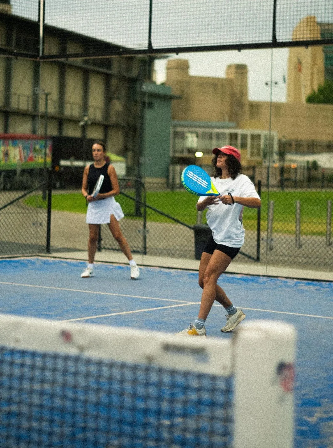 Padel doubles on an outdoor court at Sydney Racquet Club